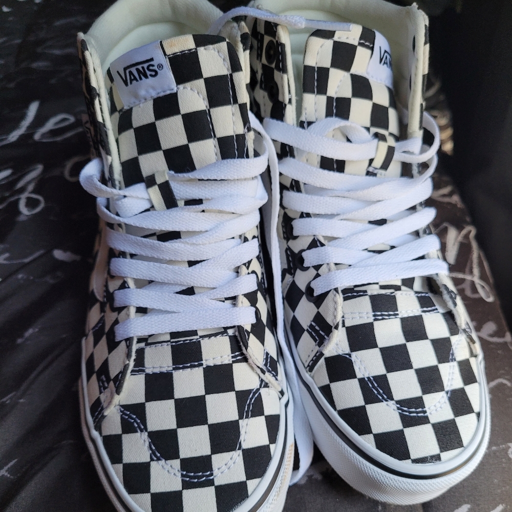 Women's black and white checkered Vans size 7